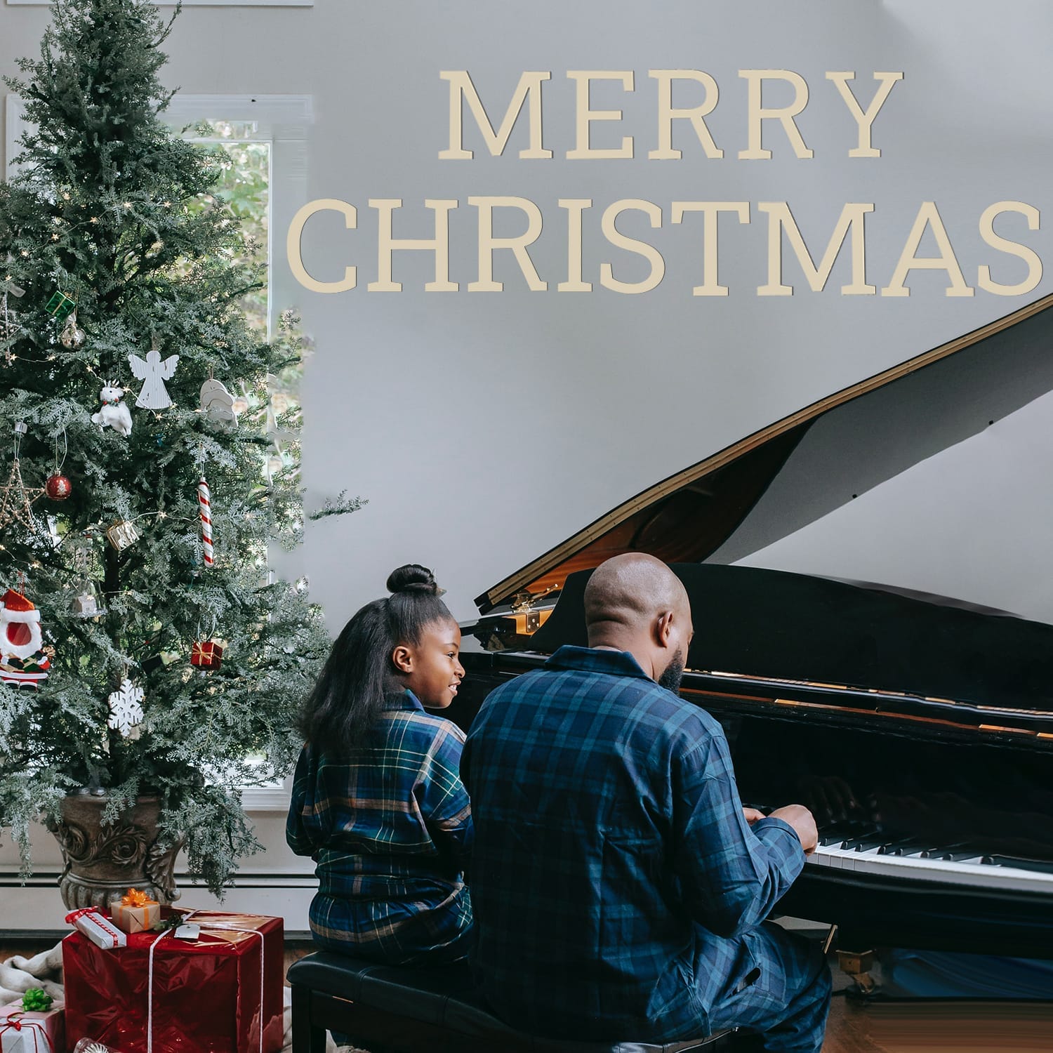 Father and daughter playing piano on Christmas; Merry Christmas